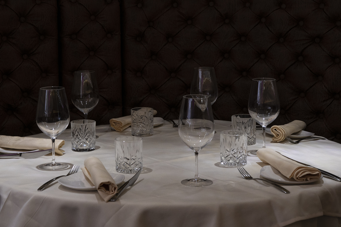 Table close up showing glasses and cutlery